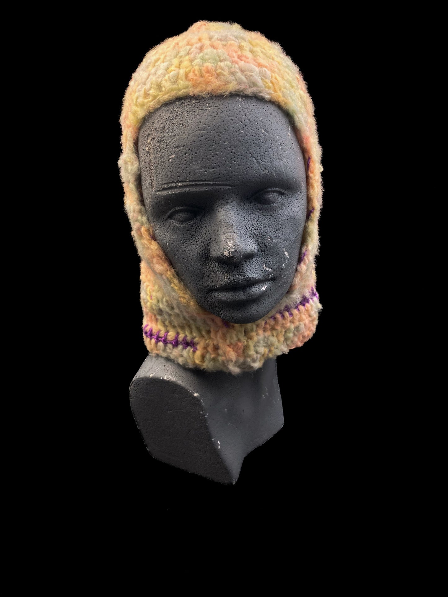 Handmade crochet balaclava with an open-face design, pastel yellow, pastel green, pastel pink, purple. Designed for a unisex fit, one size fits all.