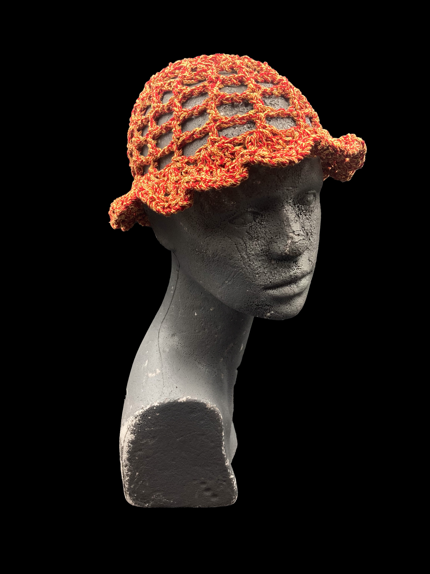 Handmade crochet bucket-hat, red-orange and yellow. Designed for a unisex fit, one size fits all.
