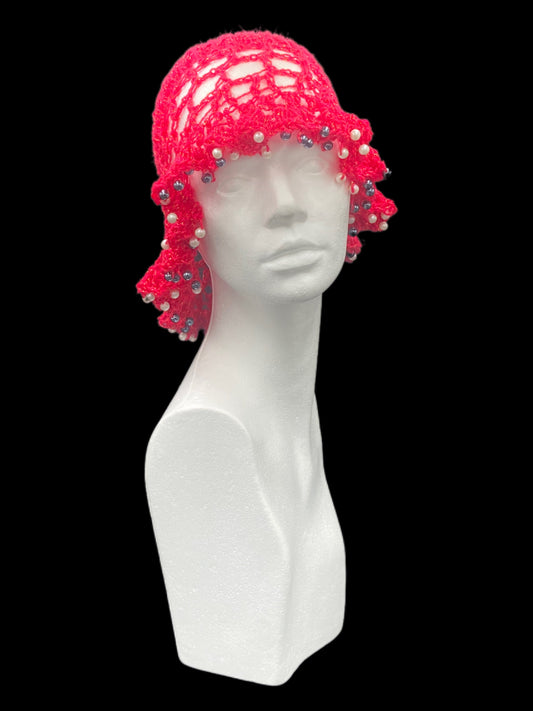 Handmade crochet hat, red with black and white beads. Designed for a unisex fit, one size fits all.