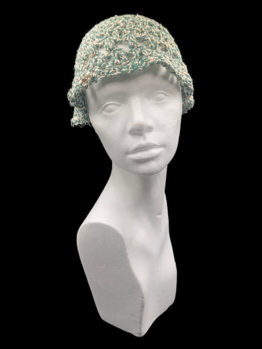 Handmade crochet hat, green and white. Designed for a unisex fit, one size fits all.
