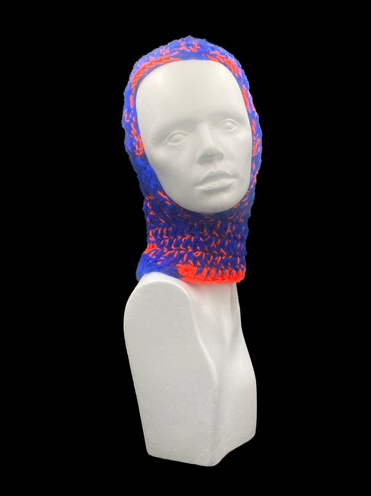 Handmade crochet balaclava with an open-face design, orange and blue. Designed for a unisex fit, one size fits all.

