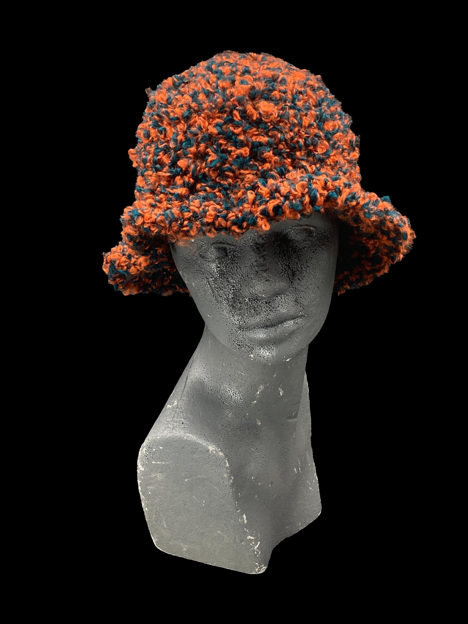 Handmade crochet bucket-hat, orange and green. Designed for a unisex fit, one size fits all.