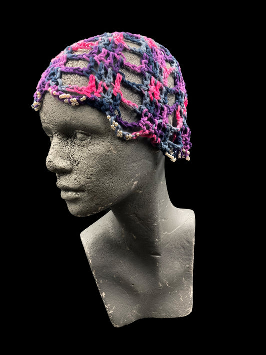 Handmade crochet hat, pink, purple and dark blue with white beads. Designed for a unisex fit, one size fits all.