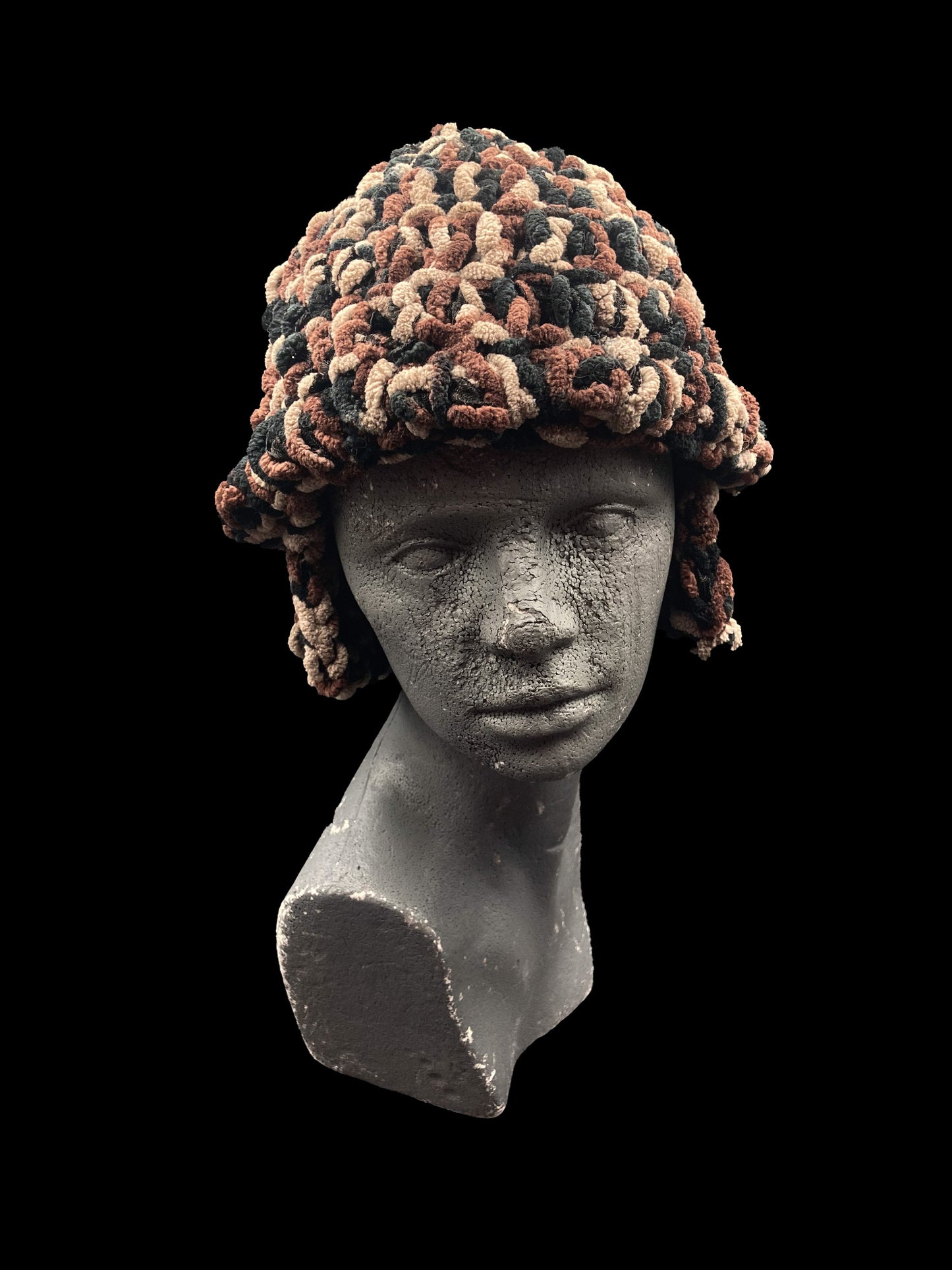Handmade crochet headwear features a cozy ear-covering design, black, brown, beige. Designed for a unisex fit, one size fits all.

