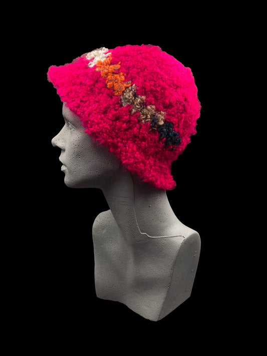 Handmade crochet bucket-hat, red-pink with a multicoloured strip. Designed for a unisex fit, one size fits all.