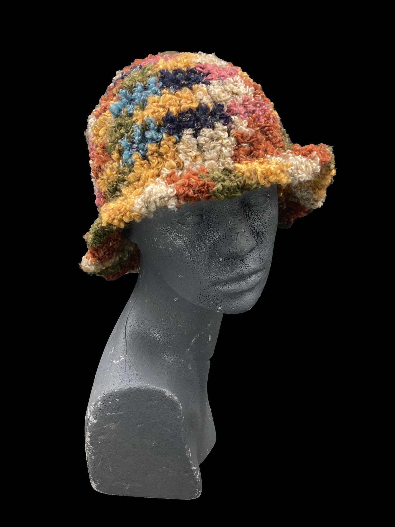 Handmade crochet bucket-hat, multicoloured. Designed for a unisex fit, one size fits all.
